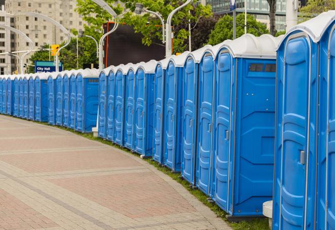 a row of portable restrooms set up for a special event, providing guests with a comfortable and sanitary option in Altamonte Springs